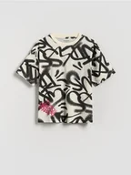 Koszulki dla chłopców - Reserved - Bawełniany t-shirt z nadrukiem - złamana biel - miniaturka - grafika 1