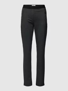 Spodnie damskie - Spodnie materiałowe o kroju skinny fit ze wzorem w pepitkę - grafika 1