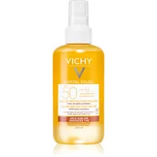 Balsamy i kremy do opalania - Vichy Capital Soleil ochronny spray z betakarotenem SPF 50 200 ml - miniaturka - grafika 1