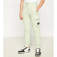 Spodnie i spodenki dla chłopców - CALVIN KLEIN JEANS Spodnie dresowe | Relaxed fit - miniaturka - grafika 1