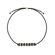 Bransoletki - Bransoletka sznurkowa z czarnym onyksem i złotymi akcentami subtelna biżuteria damska - Manoki - miniaturka - grafika 1