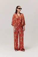 Spodnie damskie - Spodnie w etniczne wzory Azteco czerwone - miniaturka - grafika 1