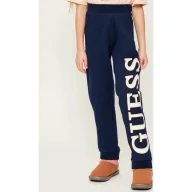 Spodnie sportowe damskie - Guess Spodnie dresowe Regular Fit - miniaturka - grafika 1