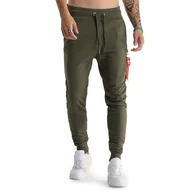 Spodnie sportowe męskie - Spodnie Alpha Industries X-Fit Slim Cargo 178333257 - zielone - miniaturka - grafika 1