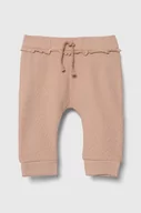 Spodnie i spodenki dla dziewczynek - United Colors of Benetton spodnie dresowe niemowlęce kolor różowy gładkie - miniaturka - grafika 1