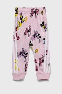 Spodnie i spodenki dla dziewczynek - adidas Performance spodnie dresowe dziecięce kolor różowy wzorzyste - grafika 1