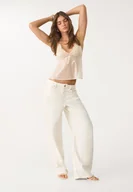 Koszulki i topy damskie - Stradivarius Top z dekoltem halter z cekinami Waniliowy L - miniaturka - grafika 1