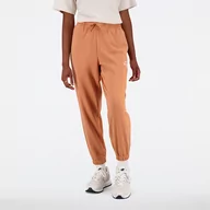 Spodnie męskie - Spodnie damskie New Balance WP31508SEI  brązowe - miniaturka - grafika 1