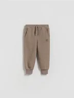 Spodenki dla niemowląt - Reserved - Dresowe joggery - ciemnobrązowy - miniaturka - grafika 1