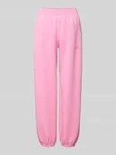 Spodnie sportowe damskie - Spodnie dresowe o luźnym kroju z dodatkiem bawełny - miniaturka - grafika 1