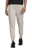 Spodnie damskie - Spodnie damskie Adidas W SL dresowe joggery -S - miniaturka - grafika 1