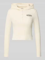 Bluzki damskie - Bluzka o kroju slim fit z długim rękawem, kapturem i wyhaftowanym logo - miniaturka - grafika 1