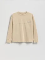 Bluzki dla chłopców - Reserved - Bawełniany longsleeve - beżowy - miniaturka - grafika 1