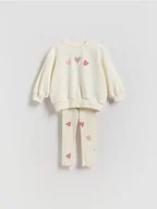 Spodnie i spodenki dla dziewczynek - Reserved - Bawełniany komplet z nadrukiem - złamana biel - miniaturka - grafika 1