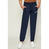 Spodnie i spodenki dla chłopców - Tommy Hilfiger Spodnie dresowe VARSITY | Regular Fit - miniaturka - grafika 1