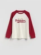 Bluzki dla chłopców - Reserved - Bawełniany longsleeve z nadrukiem - złamana biel - miniaturka - grafika 1