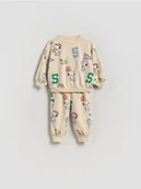 Bluzy i sweterki niemowlęce - Reserved - Bawełniany komplet Snoopy - złamana biel - miniaturka - grafika 1