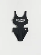 Stroje kąpielowe dla dziewczynek - Reserved - Kostium kąpielowy z motywem Stranger Things - czarny - miniaturka - grafika 1