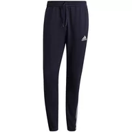 Spodnie męskie - Spodnie męskie adidas Essentials Tapered Elastic Cuff 3 Stripes Pant granatowe GK8830-S - miniaturka - grafika 1