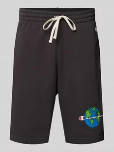 Szorty z dzianiny dresowej kroju regular fit z nadrukiem z motywem - Spodnie sportowe męskie - miniaturka - grafika 1
