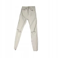 Spodnie damskie - Jeansowe spodnie damskie z dziurami ZARA 36 - miniaturka - grafika 1