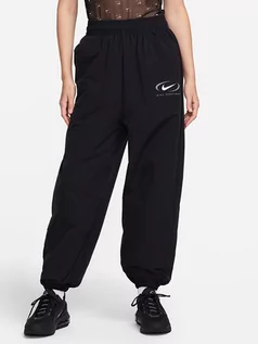 Spodnie sportowe damskie - Nike Spodnie dresowe w kolorze czarnym - grafika 1