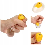 Zabawki sensoryczne - Gniotek Antystresowy Do Ściskania Przezroczyste Jajko Z Żółtkiem Fidget - miniaturka - grafika 1