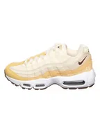 Trampki damskie - Nike Skórzane sneakersy "Air Max 95" w kolorze kremowo-żółtym - miniaturka - grafika 1