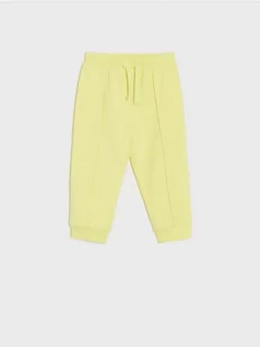 Spodnie i spodenki dla dziewczynek - Sinsay - Spodnie dresowe jogger - zielony - grafika 1