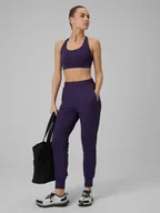 Spodnie sportowe damskie - 4F Spodnie treningowe szybkoschnące damskie - fioletowe XXL - miniaturka - grafika 1