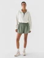 Spodnie sportowe damskie - Damskie spodenki treningowe 4F x Anna Lewandowska 4FALSAW24TFSHF0979 - zielone - 4F x AL - miniaturka - grafika 1