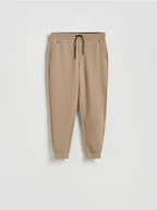 Spodnie sportowe męskie - Reserved - Spodnie dresowe slim fit - beżowy - miniaturka - grafika 1