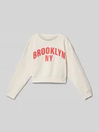 Bluzy dla dziewczynek - Bluza o kroju oversized z nadrukiem z napisem - miniaturka - grafika 1
