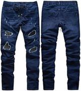 Spodnie męskie - Spodnie jeansowe męskie granatowe z łatami Recea - miniaturka - grafika 1