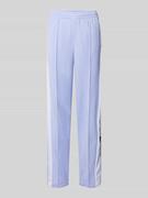 Spodnie damskie - Spodnie dresowe o kroju regular fit z lampasami model ‘ADIBREAK’ - miniaturka - grafika 1