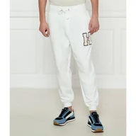 Dresy męskie - Tommy Jeans Spodnie dresowe Regular Fit - miniaturka - grafika 1