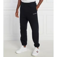 Dresy męskie - Tommy Hilfiger Spodnie dresowe MONOTYPE EMBRO SWEATPANT | Regular Fit - miniaturka - grafika 1