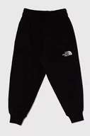 Spodnie i spodenki dla dziewczynek - The North Face spodnie dresowe bawełniane dziecięce OVERSIZED JOGGERS kolor czarny gładkie - miniaturka - grafika 1