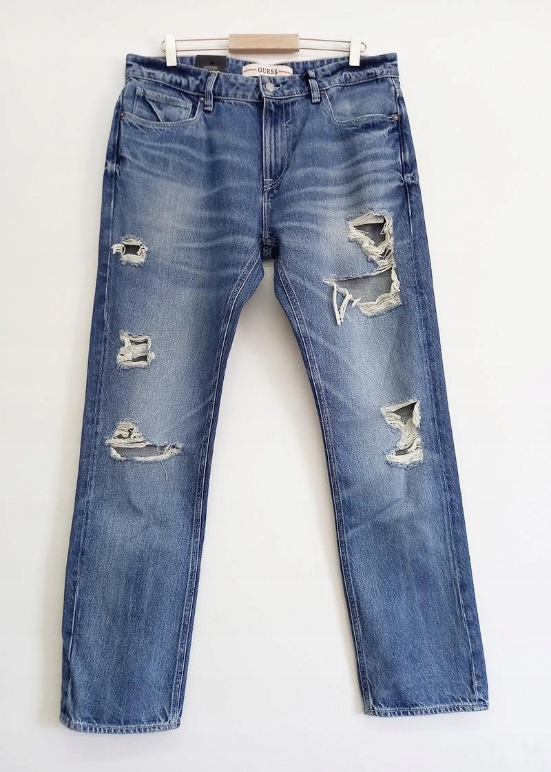 GUESS NIEBIESKIE RURKI JEANSOWE Z PRZETARCIAMI I DZIURAMI 33/32 GGA