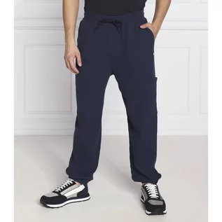 Dresy męskie - Tommy Jeans Spodnie dresowe TJM BAX | Regular Fit - grafika 1