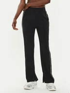 Spodnie sportowe damskie - Calvin Klein Performance Spodnie dresowe 00GWF4P603 Czarny Regular Fit - miniaturka - grafika 1