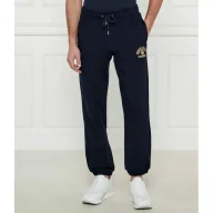 Dresy męskie - Guess Jeans Spodnie dresowe Regular Fit - miniaturka - grafika 1