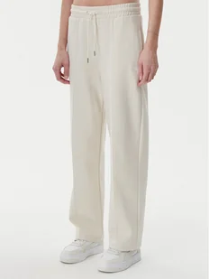 Puma Spodnie dresowe Ess 629774 Beżowy Straight Fit - Spodnie sportowe damskie - miniaturka - grafika 1