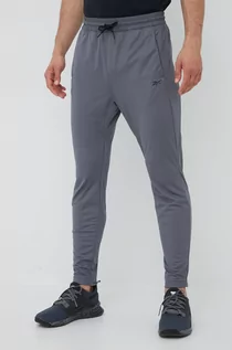 Spodnie męskie - Reebok spodnie dresowe Workout Ready męskie kolor szary gładkie - grafika 1