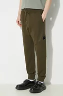 Spodnie męskie - C.P. Company spodnie dresowe bawełniane Diagonal Raised Fleece kolor zielony gładkie 16CMSP084A005086W - miniaturka - grafika 1