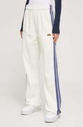 Spodnie damskie - Ellesse spodnie dresowe bawełniane kolor beżowy z aplikacją - miniaturka - grafika 1