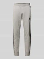 Spodnie sportowe męskie - Spodnie dresowe z elastycznym ściągaczem - miniaturka - grafika 1