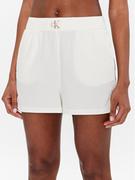 Spodenki damskie - Calvin Klein Jeans Szorty sportowe J20J220687 Biały Regular Fit - miniaturka - grafika 1