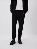 Spodnie sportowe męskie - Reserved - Spodnie dresowe regular fit - czarny - miniaturka - grafika 1
