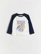 Bluzki dla niemowląt - Reserved - Bawełniany longsleeve Bluey - złamana biel - miniaturka - grafika 1